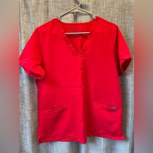 Bright red FIG scrubs